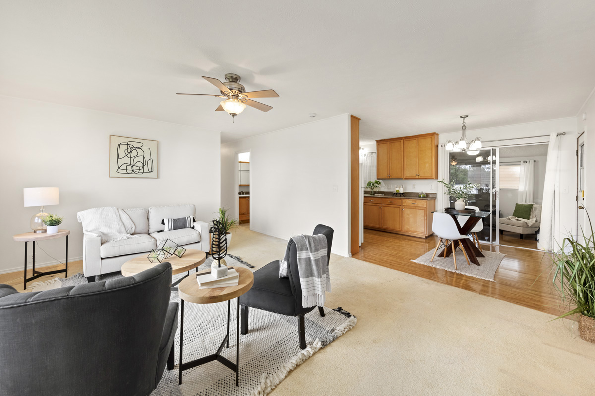 49 Iiwipolena Road Hilo, HI 96720 - Photo 5 of 30 a living room with furniture a flat screen tv and a table