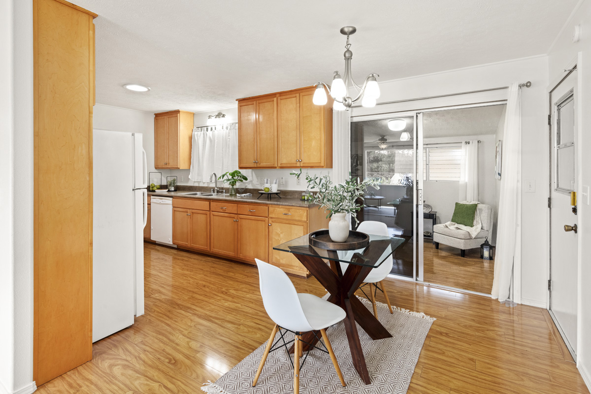 49 Iiwipolena Road Hilo, HI 96720 - Photo 6 of 30 a view of a kitchen with dining space and windows