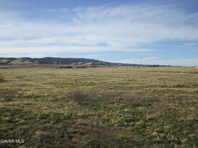 a view of an ocean and mountain