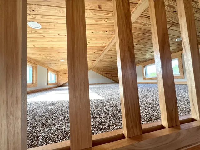 a view of a living room with a large window