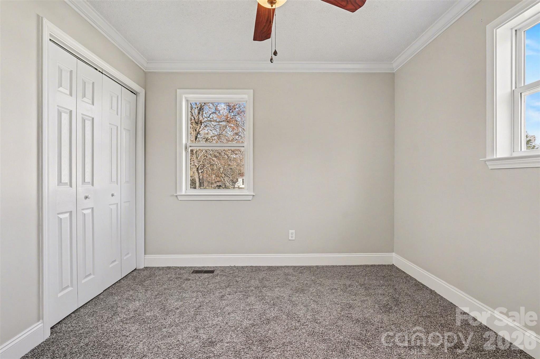 1050 Legion Club Road Salisbury, NC 28146 - Photo 18 of 29 an empty room with windows