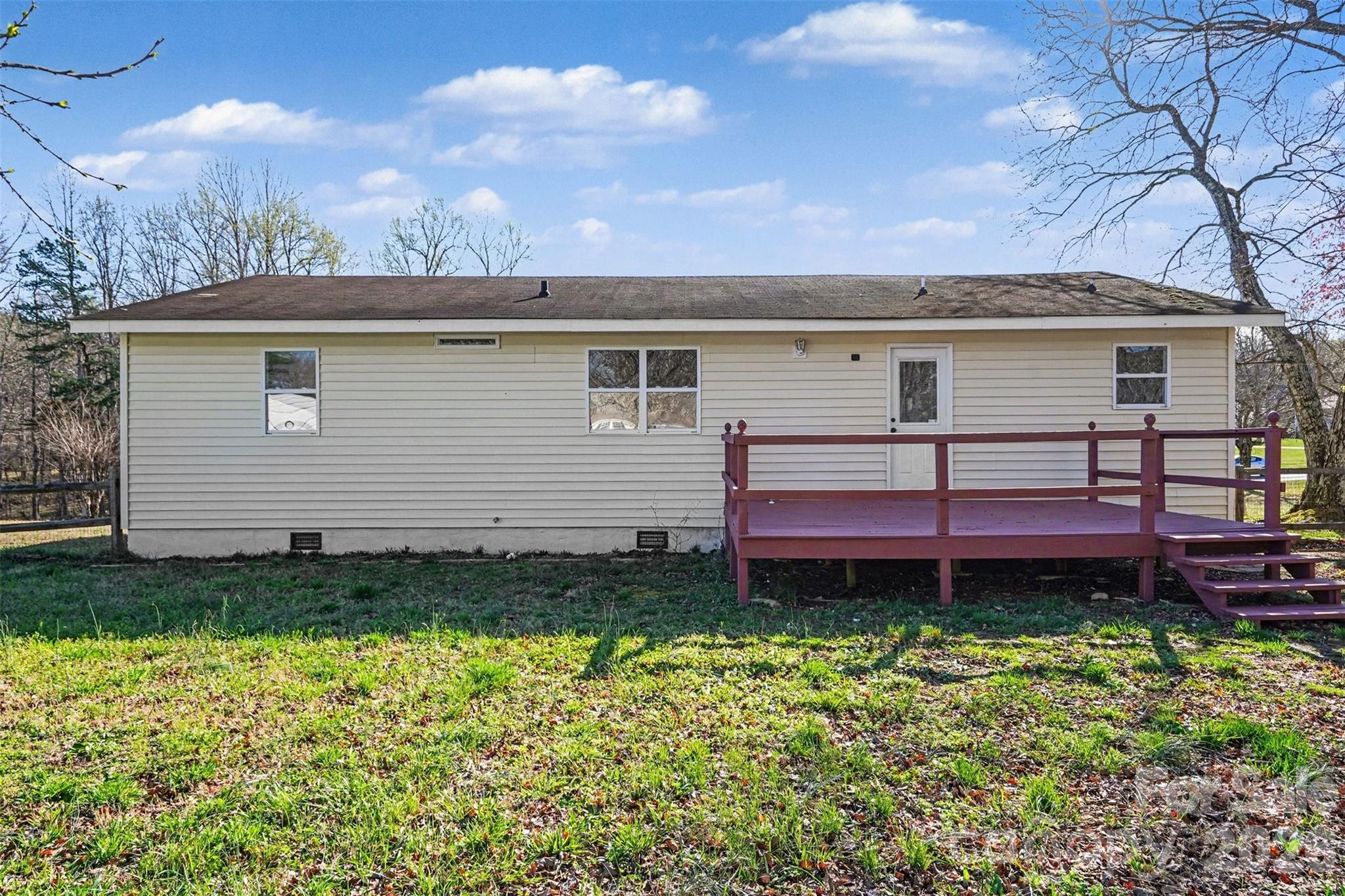1050 Legion Club Road Salisbury, NC 28146 - Photo 25 of 29 a front view of a house with a garden