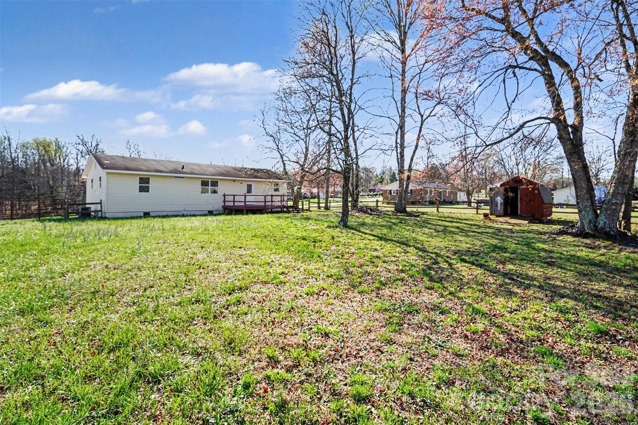 1050 Legion Club Road Salisbury, NC 28146 - Photo 27 of 29 a view of a backyard with large trees