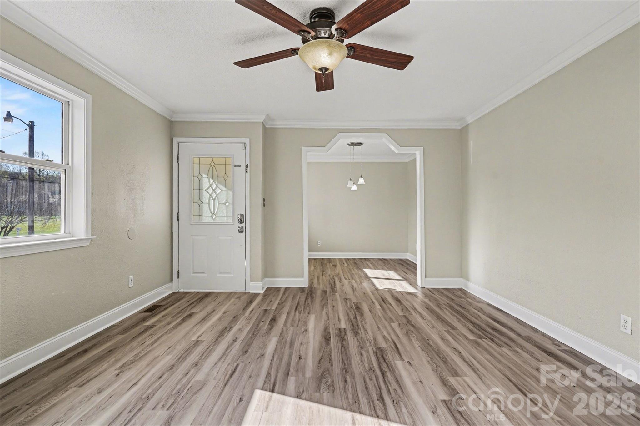 1050 Legion Club Road Salisbury, NC 28146 - Photo 4 of 29 wooden floor in an empty room with a window