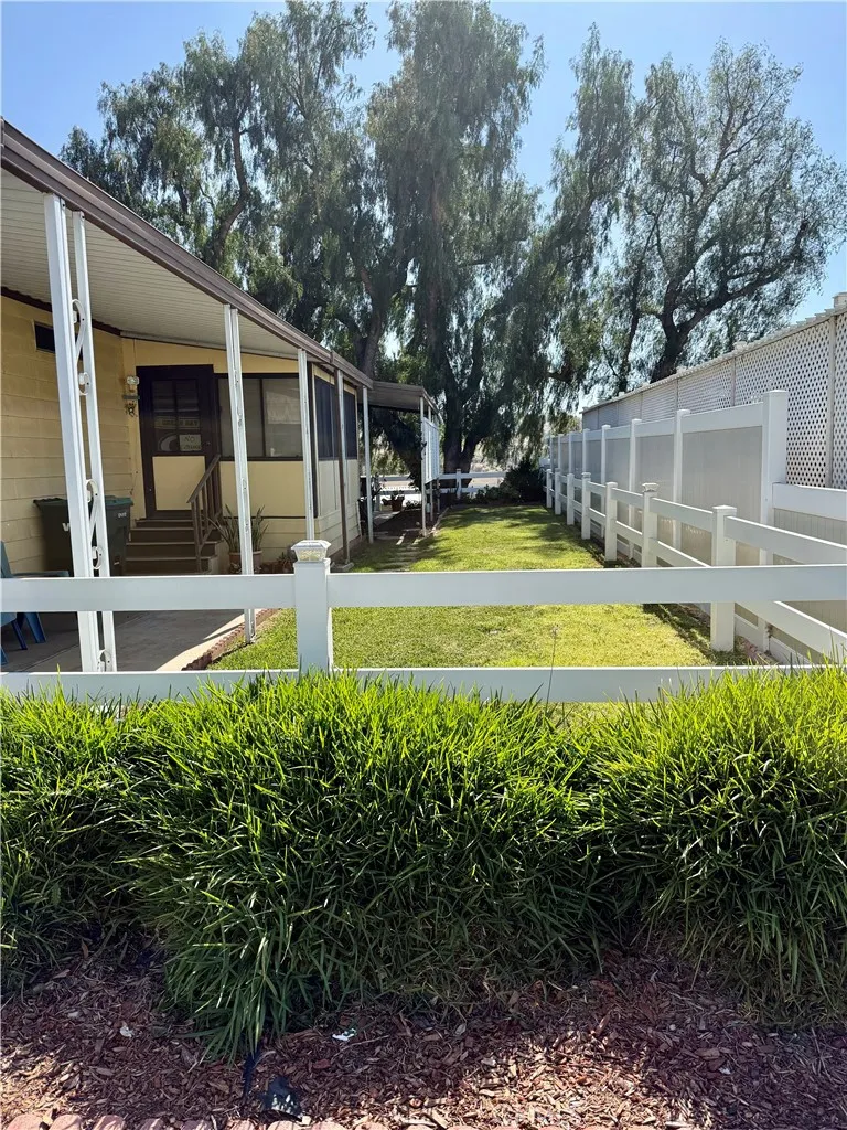 15181 Van Buren Riverside, CA 92504 - Photo 20 of 26 a view of a house with backyard and swimming pool