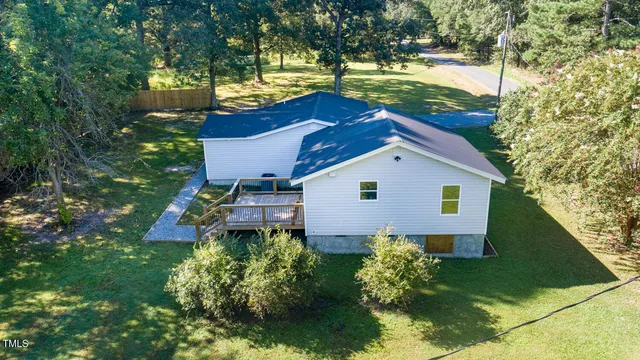 a view of a backyard with a tub