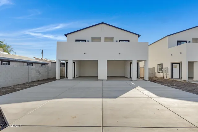a front view of a house with a garage