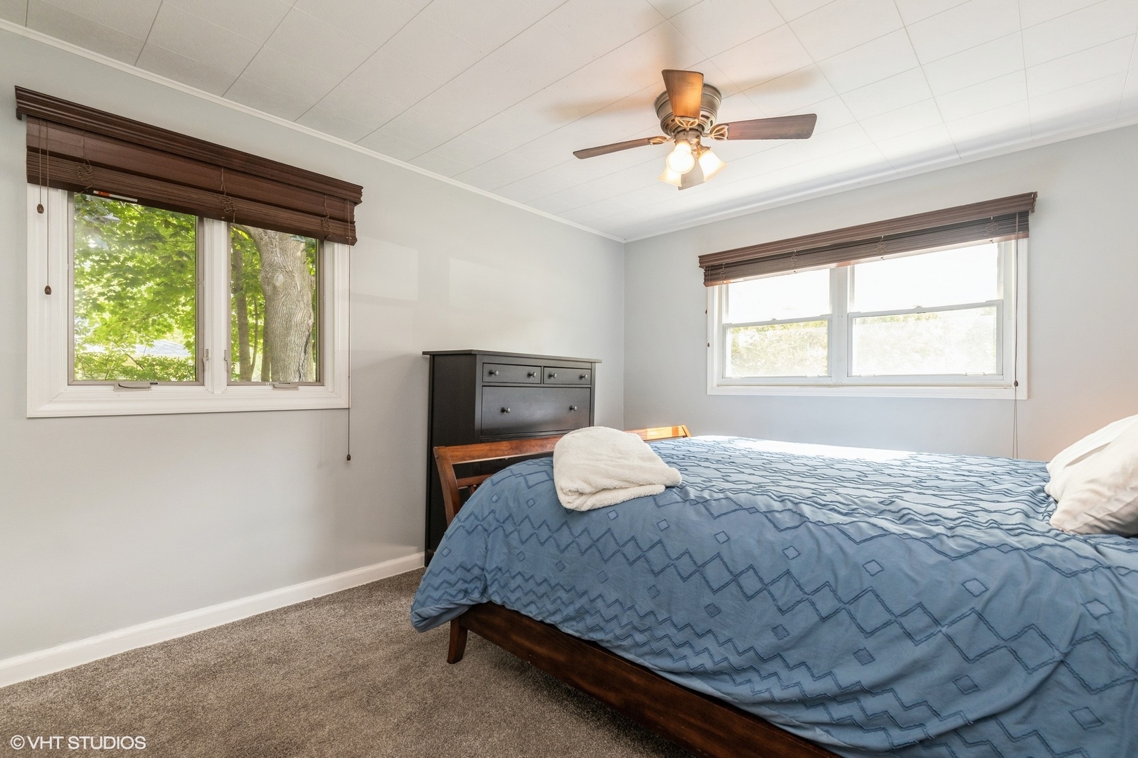 24 Johnathan Road Lake Zurich, IL 60047 - Photo 8 of 12 a bedroom with a bed and window