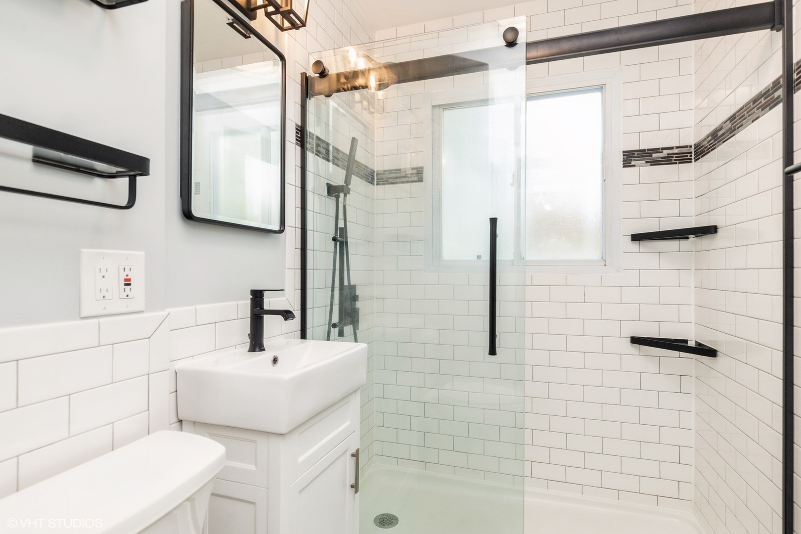 24 Johnathan Road Lake Zurich, IL 60047 - Photo 9 of 12 a bathroom with a sink toilet and shower