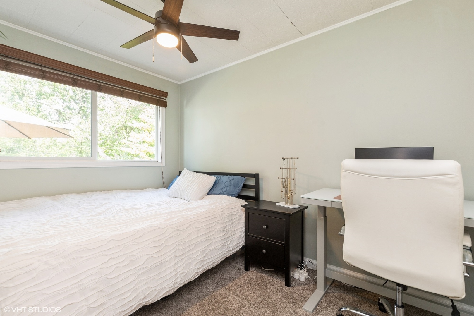 24 Johnathan Road Lake Zurich, IL 60047 - Photo 10 of 12 a bedroom with a bed and a window