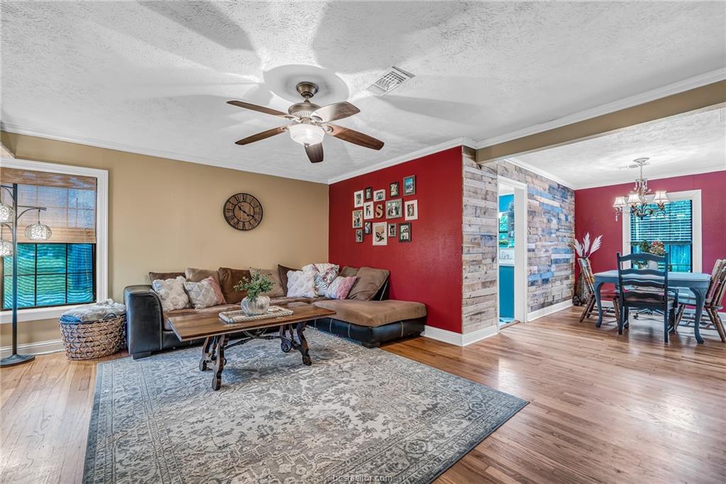 1414 East 29th Street Bryan, TX 77802 - Photo 4 of 21 a living room with furniture and wooden floor