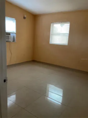 an empty room with a window