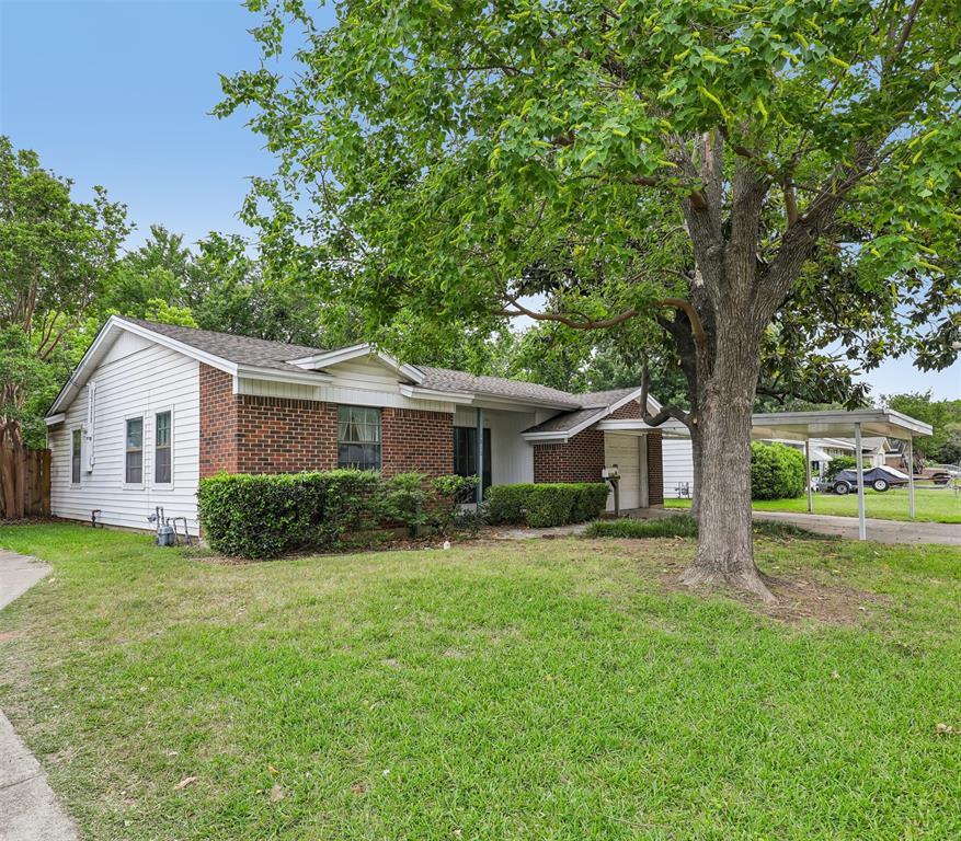 1810 Ridgewood Street Irving, TX 75062 - Photo 1 of 19 Front from the left side