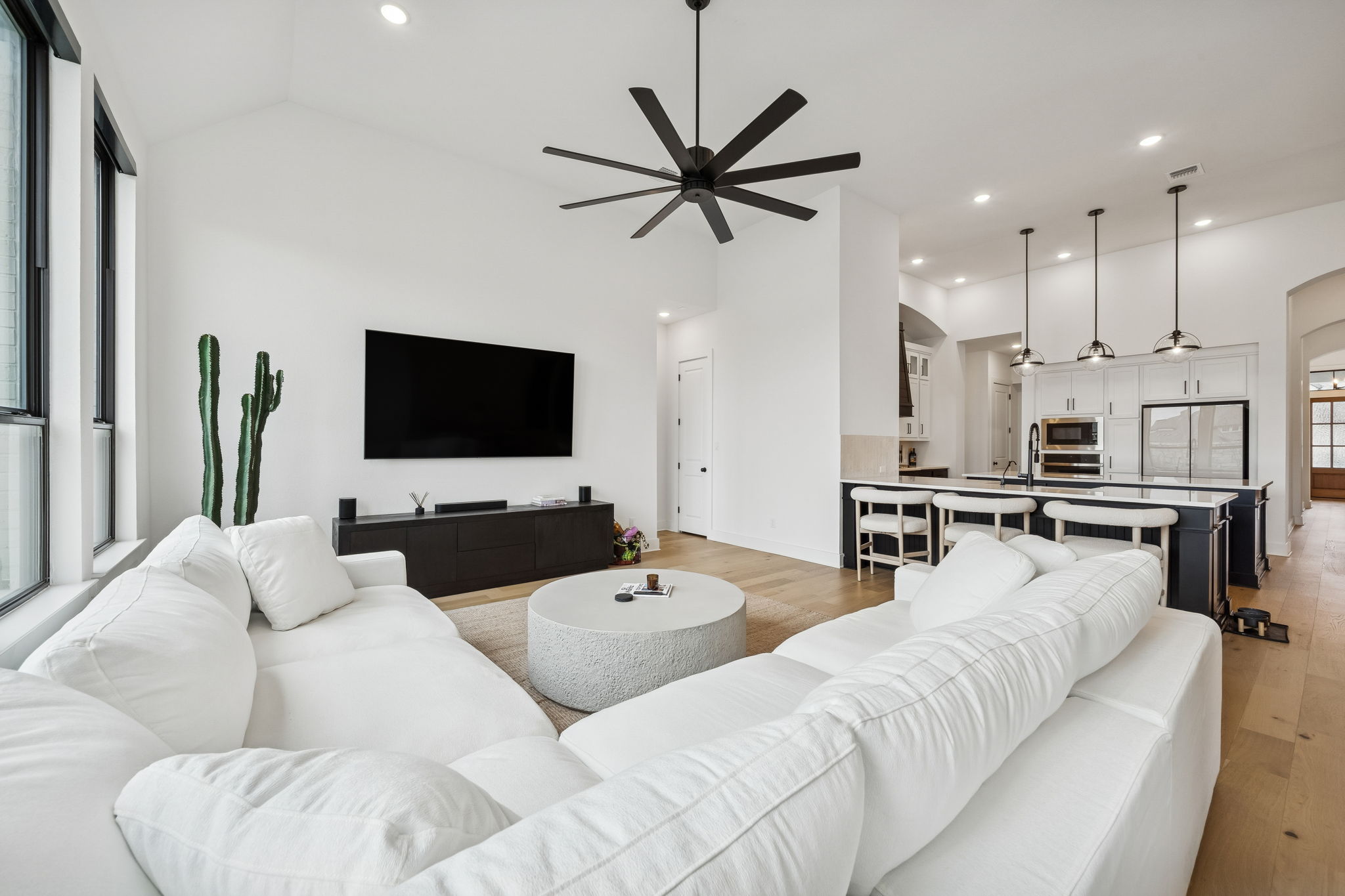 269 Iron Crk Way Kyle, TX 78640 - Photo 14 of 32 a living room with furniture and a flat screen tv