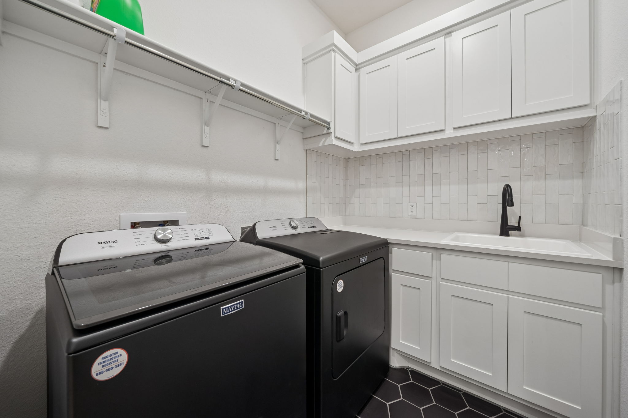 269 Iron Crk Way Kyle, TX 78640 - Photo 26 of 32 a utility room with dryer and washer