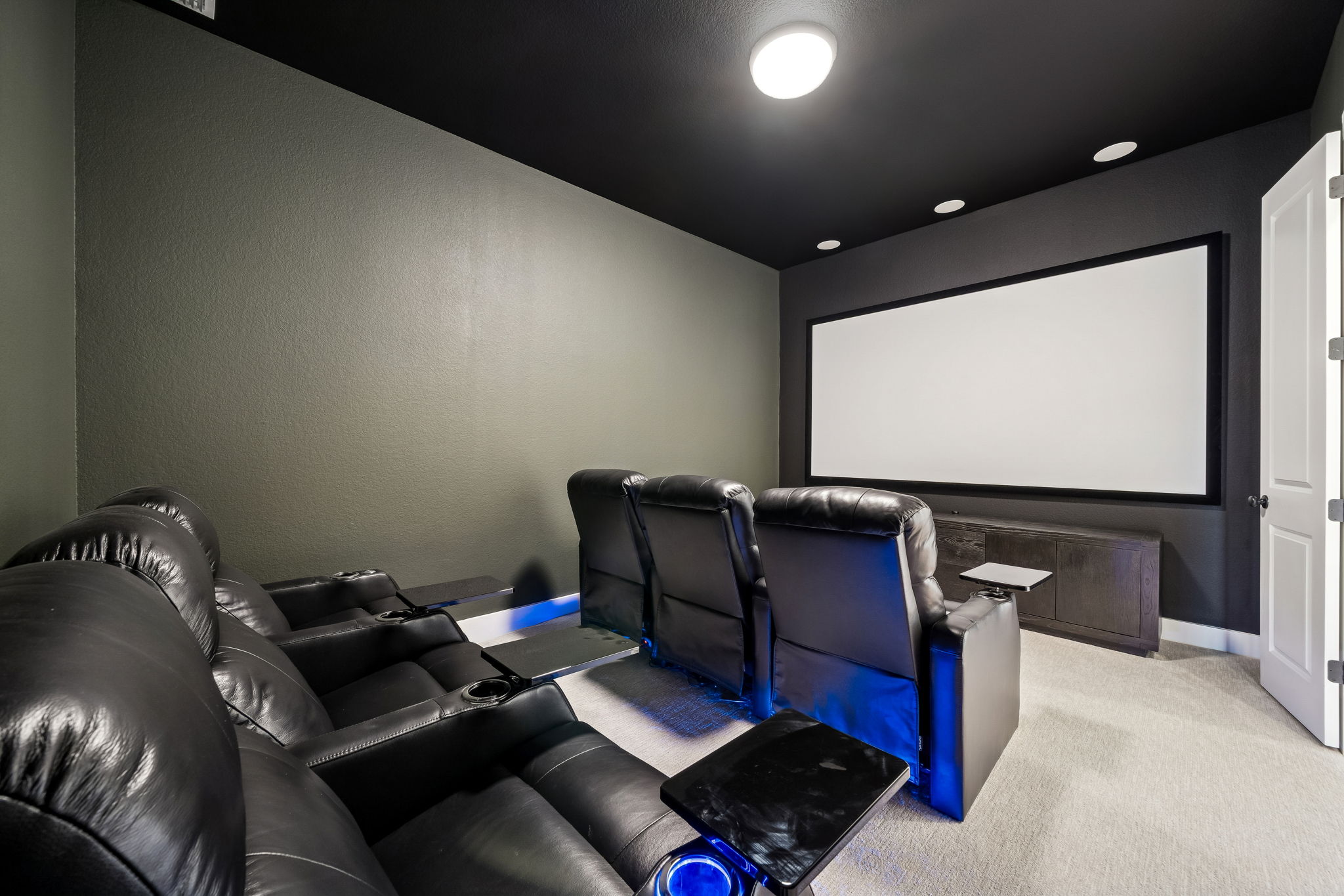 269 Iron Crk Way Kyle, TX 78640 - Photo 2 of 32 a living room with furniture and a flat screen tv