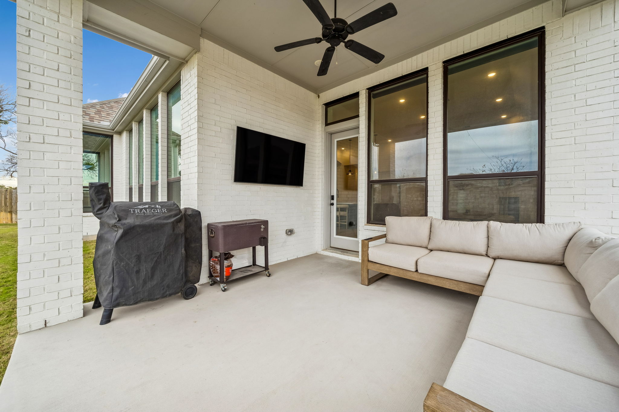 269 Iron Crk Way Kyle, TX 78640 - Photo 9 of 32 a living room with furniture and a flat screen tv
