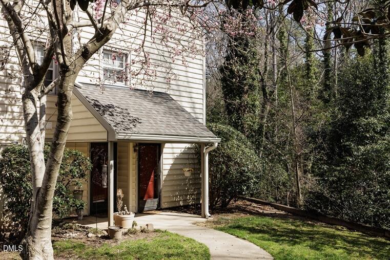 412 Oak Hollow Court Raleigh, NC 27613 - Photo 1 of 24 front view of a house with a yard