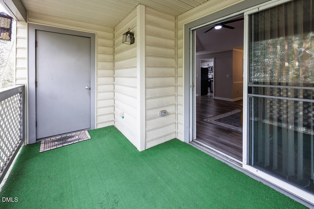 412 Oak Hollow Court Raleigh, NC 27613 - Photo 16 of 24 a view of outdoor space and yard from deck