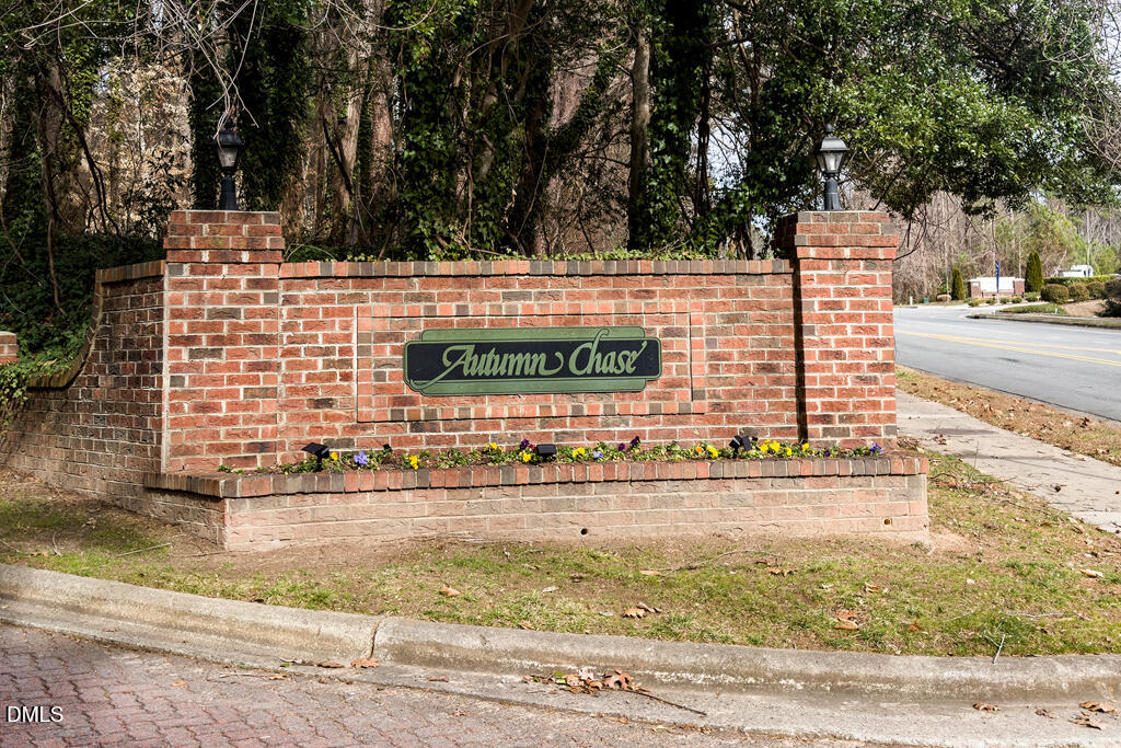 412 Oak Hollow Court Raleigh, NC 27613 - Photo 19 of 24 a view of a street with a building in the background