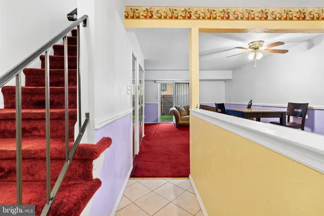 a view of a living room and a wooden floor