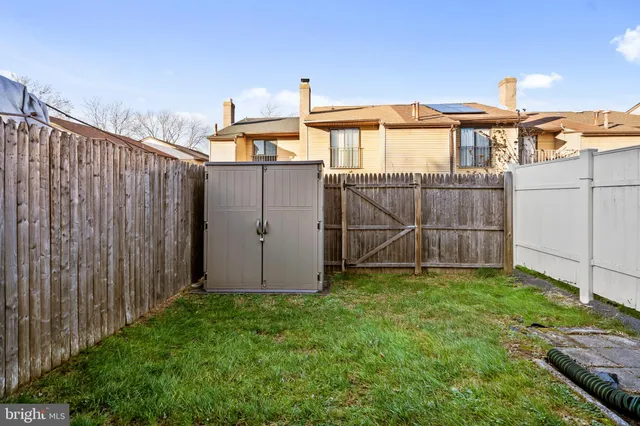 a view of a backyard with a garden