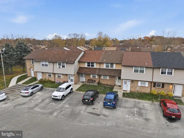 a car parked in front of a house