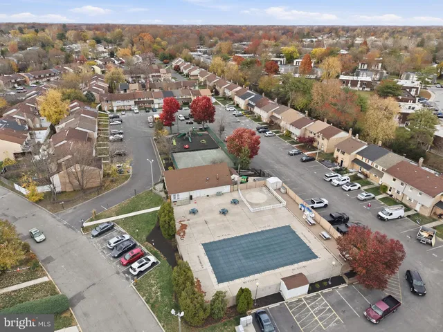 an aerial view of a city with streets