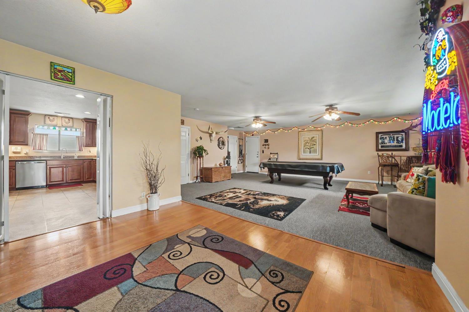 6364 Baldwin Street Valley Springs, CA 95252 - Photo 25 of 72 a living room with furniture and a wooden floor