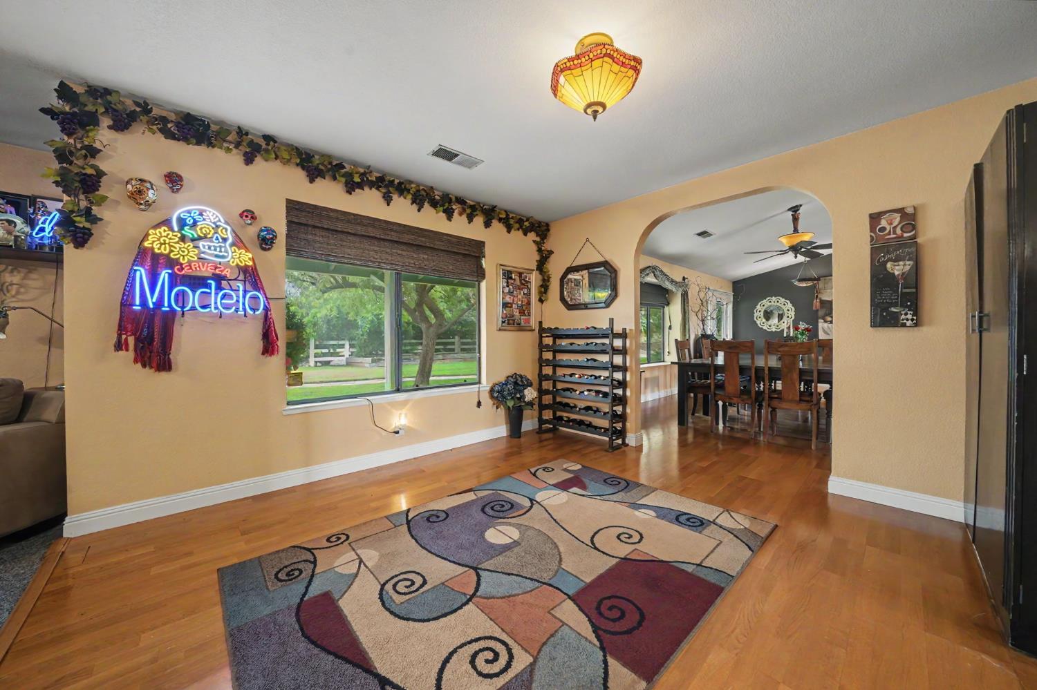 6364 Baldwin Street Valley Springs, CA 95252 - Photo 27 of 72 a living room with furniture and a window