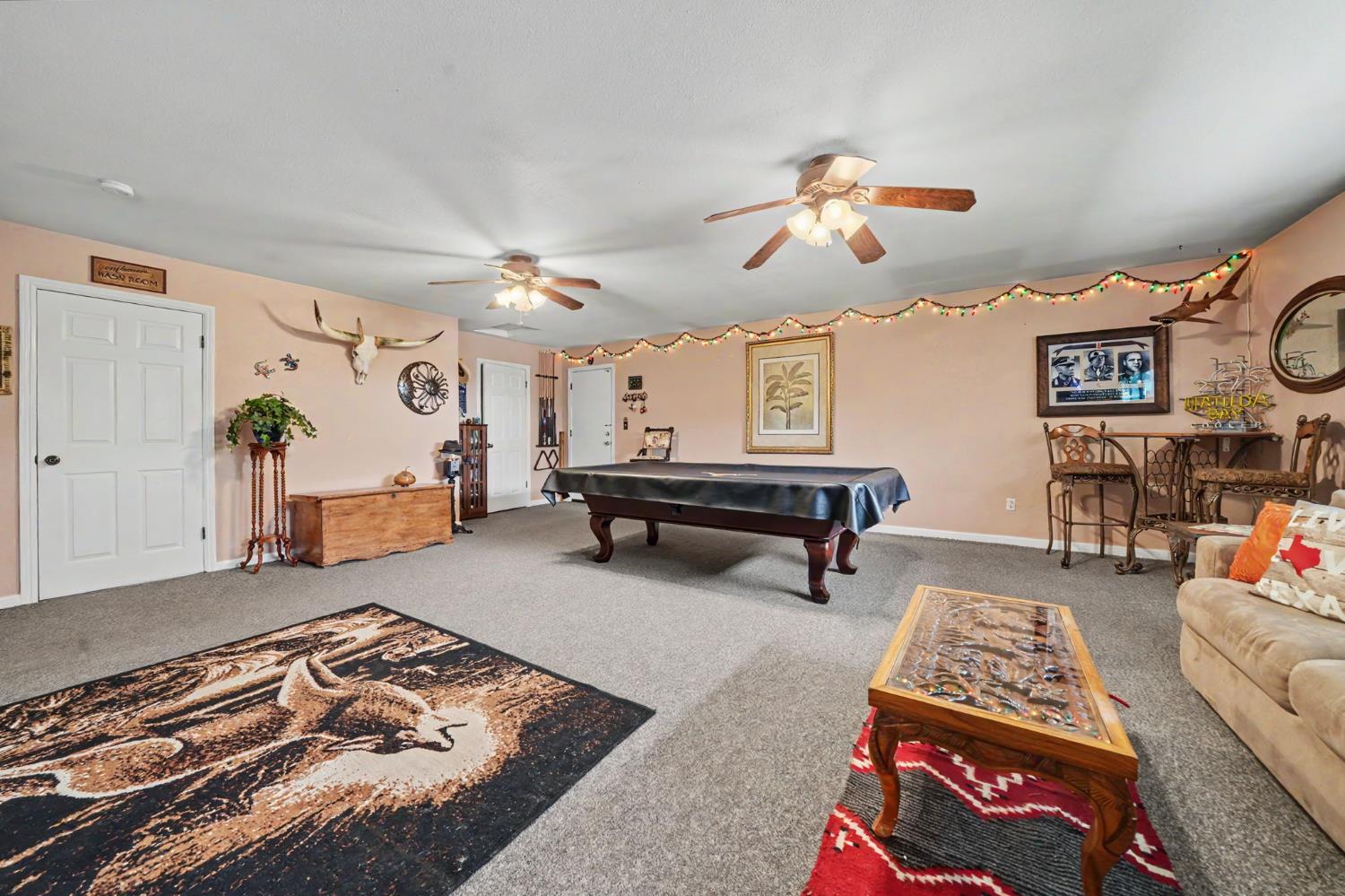 6364 Baldwin Street Valley Springs, CA 95252 - Photo 28 of 72 a living room with furniture and a rug