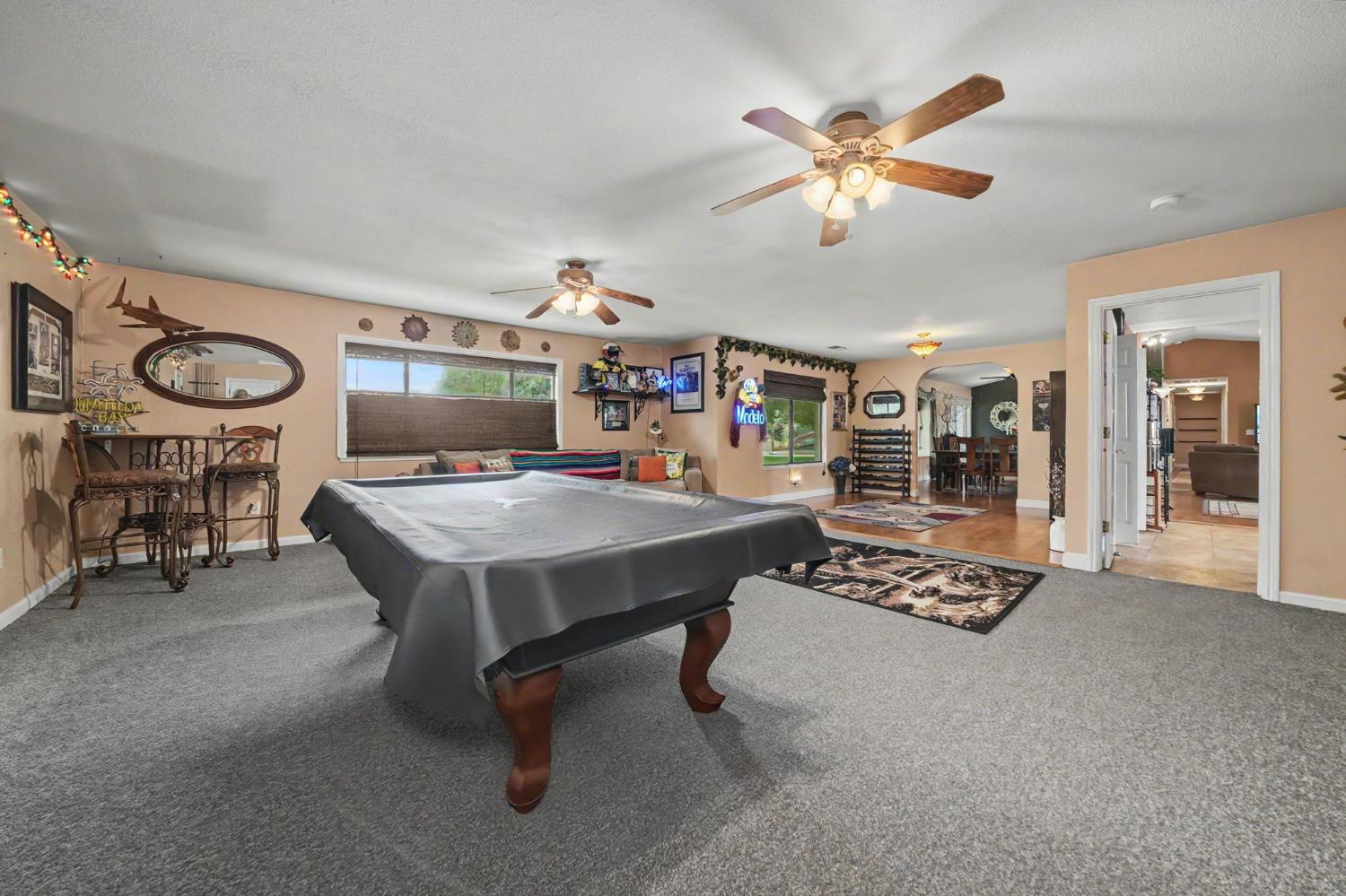6364 Baldwin Street Valley Springs, CA 95252 - Photo 30 of 72 a living room with furniture and white walls