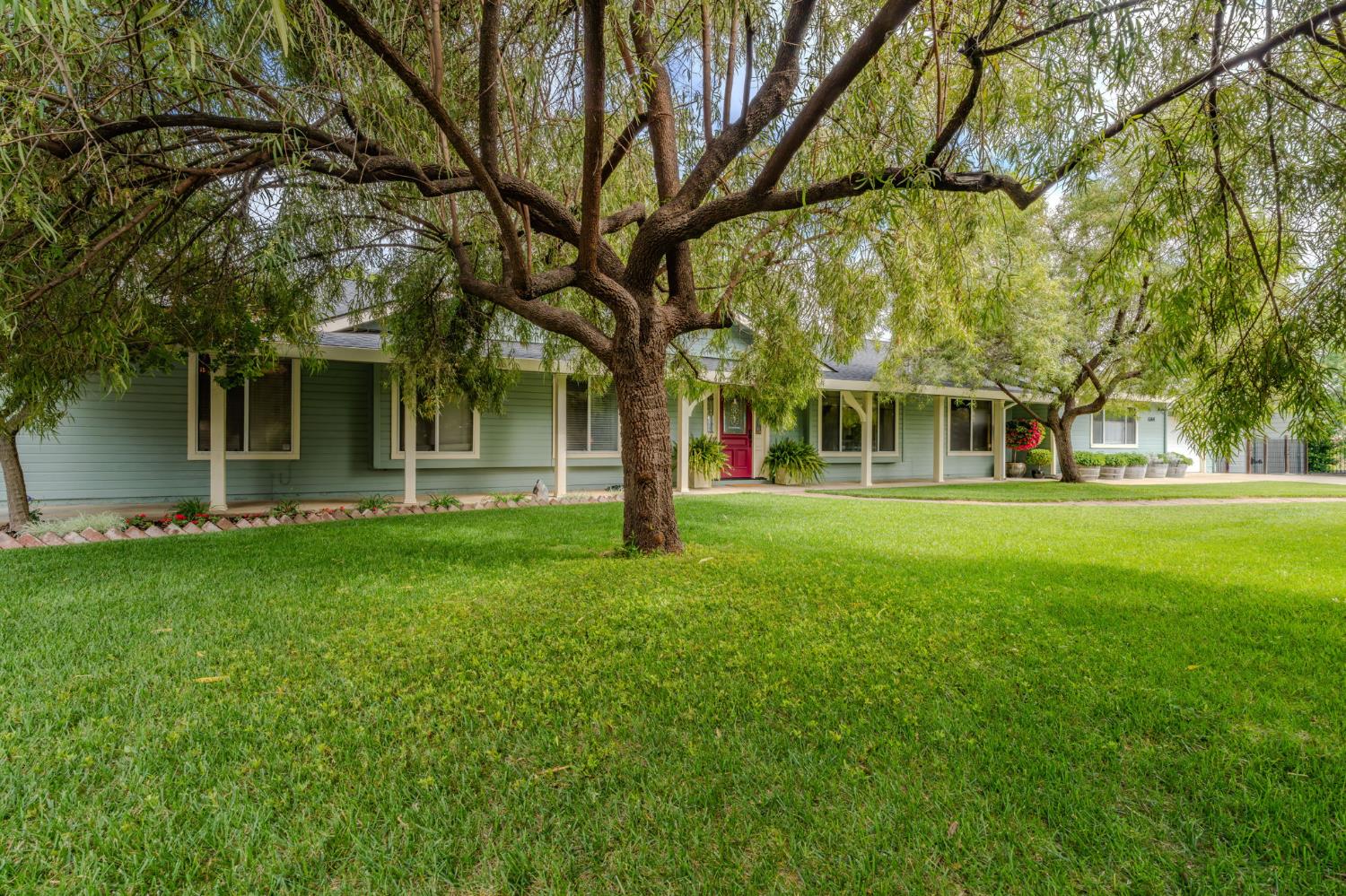 6364 Baldwin Street Valley Springs, CA 95252 - Photo 3 of 72 front view of a house with a yard