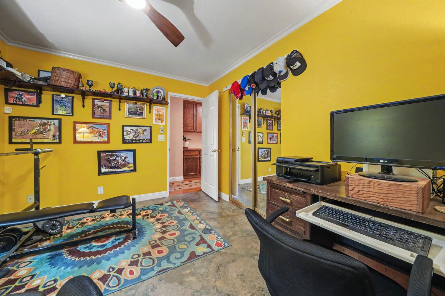 6364 Baldwin Street Valley Springs, CA 95252 - Photo 34 of 72 a room with furniture and flat screen tv