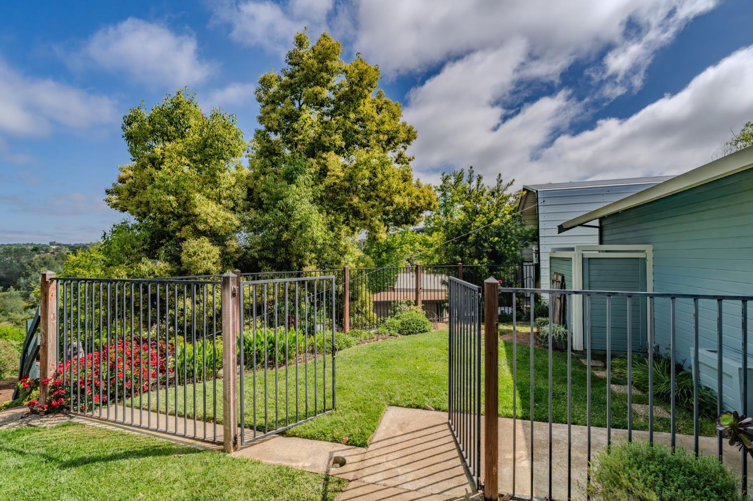 6364 Baldwin Street Valley Springs, CA 95252 - Photo 48 of 72 a view of a wrought iron fences in front of house