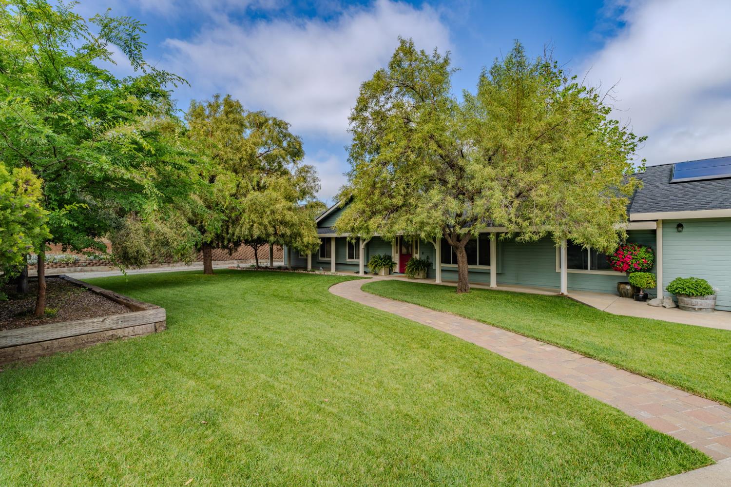 6364 Baldwin Street Valley Springs, CA 95252 - Photo 5 of 72 a view of a house with a yard