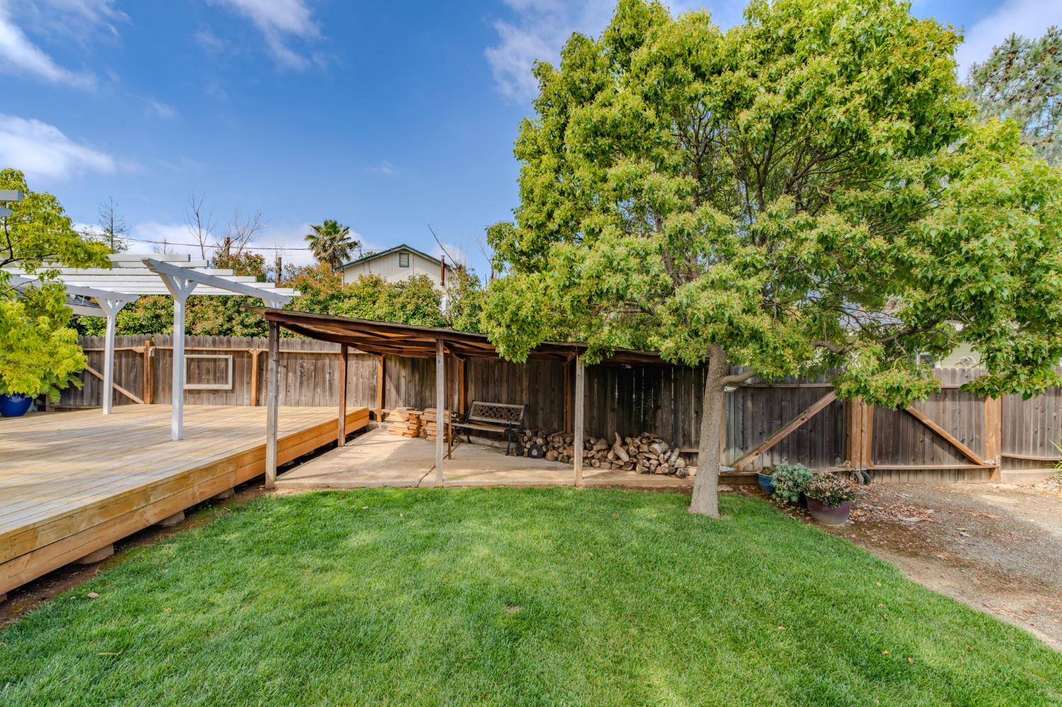 6364 Baldwin Street Valley Springs, CA 95252 - Photo 52 of 72 a view of a house with backyard porch and sitting area