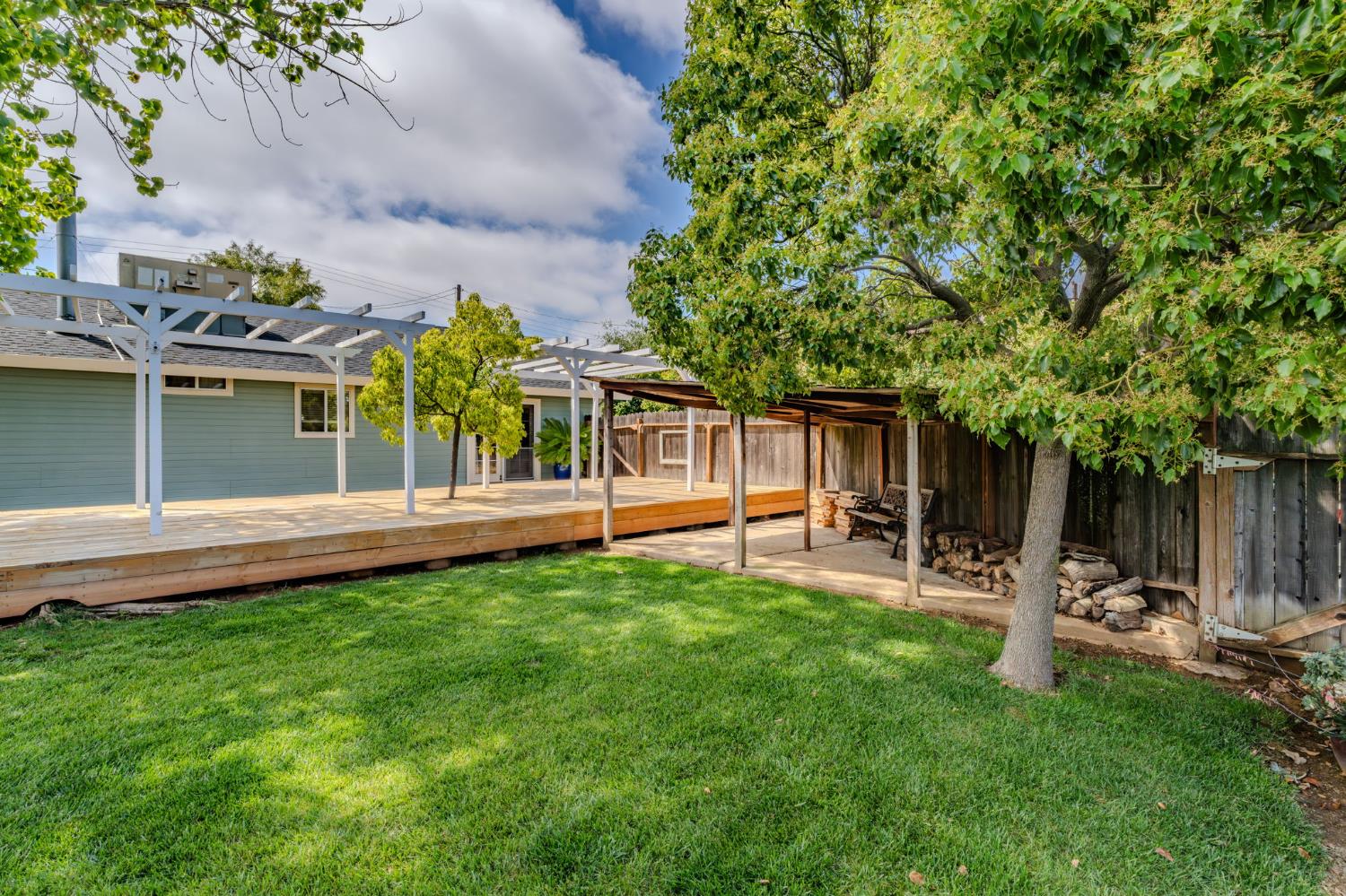 6364 Baldwin Street Valley Springs, CA 95252 - Photo 55 of 72 a view of a chair and table in backyard of the house