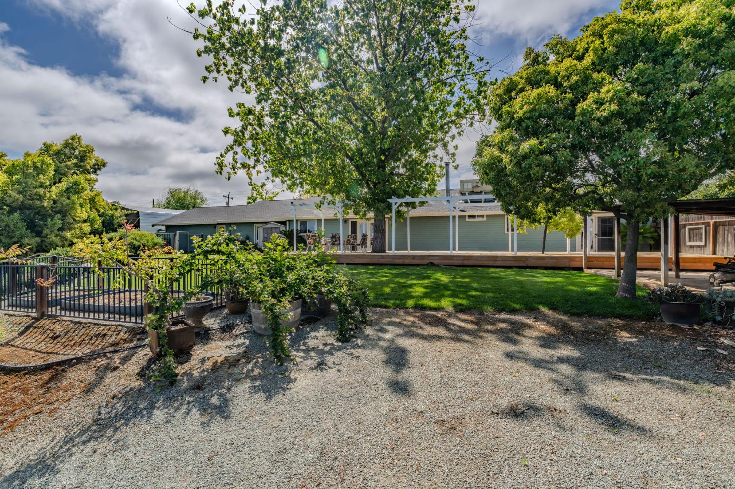6364 Baldwin Street Valley Springs, CA 95252 - Photo 57 of 72 a front view of a house with a yard