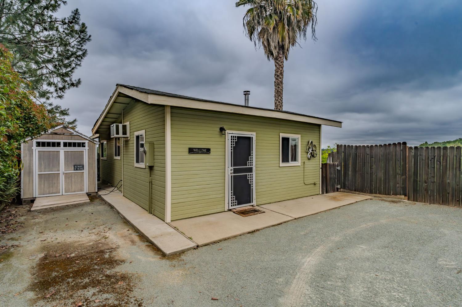 6364 Baldwin Street Valley Springs, CA 95252 - Photo 61 of 72 a front view of a house with garage