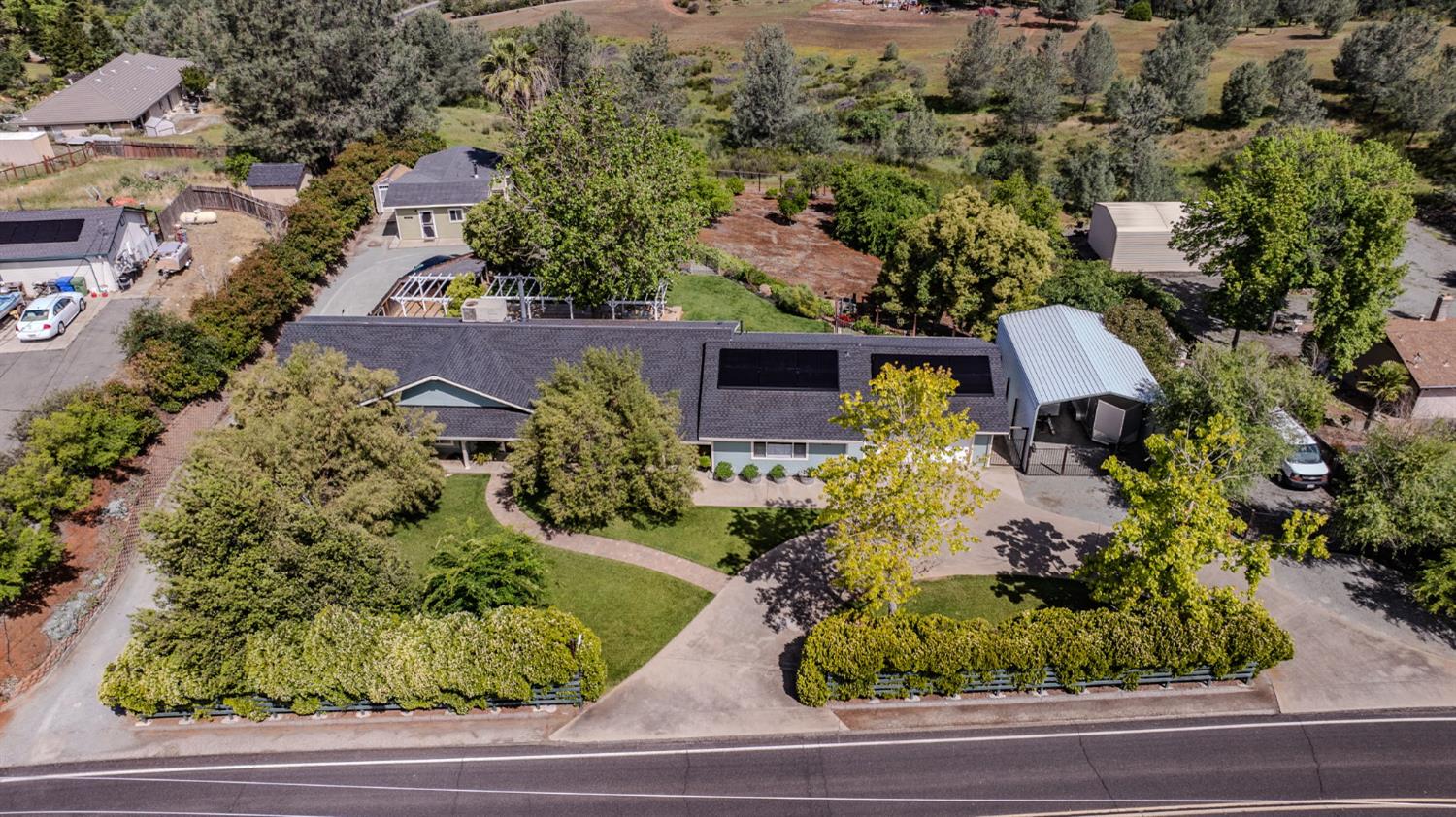 6364 Baldwin Street Valley Springs, CA 95252 - Photo 63 of 72 an aerial view of a house with a yard and garden