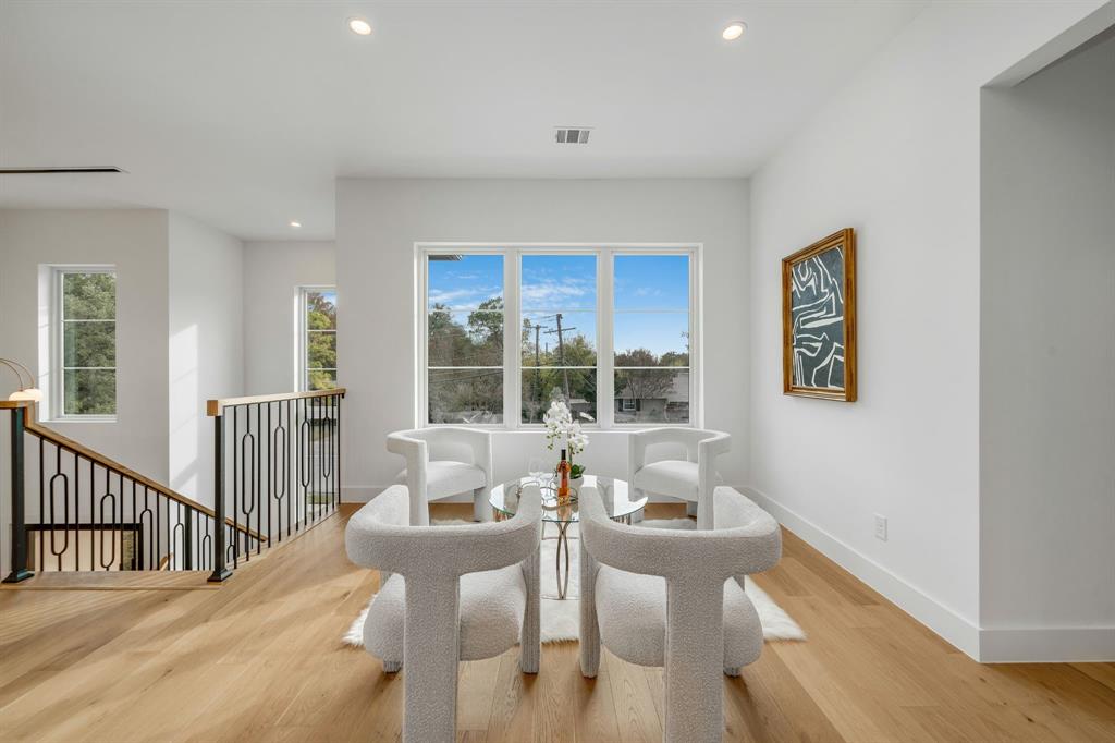 3627 Merrell Road Dallas, TX 75229 - Photo 22 of 39 a view of a dining room with furniture window and outside view