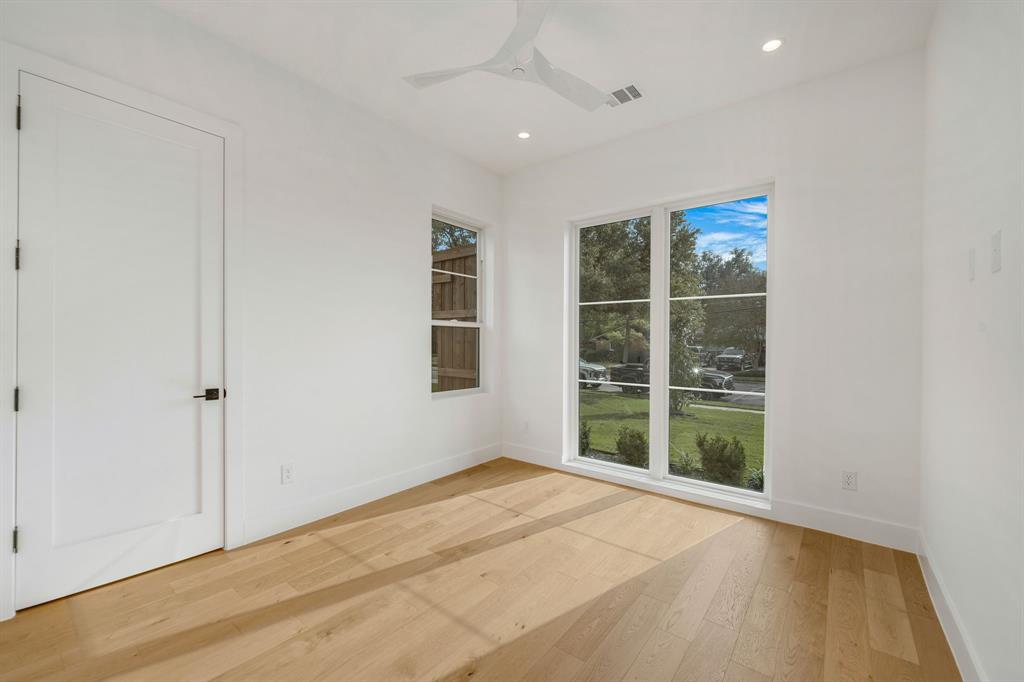 3627 Merrell Road Dallas, TX 75229 - Photo 30 of 39 a view of an empty room with a window