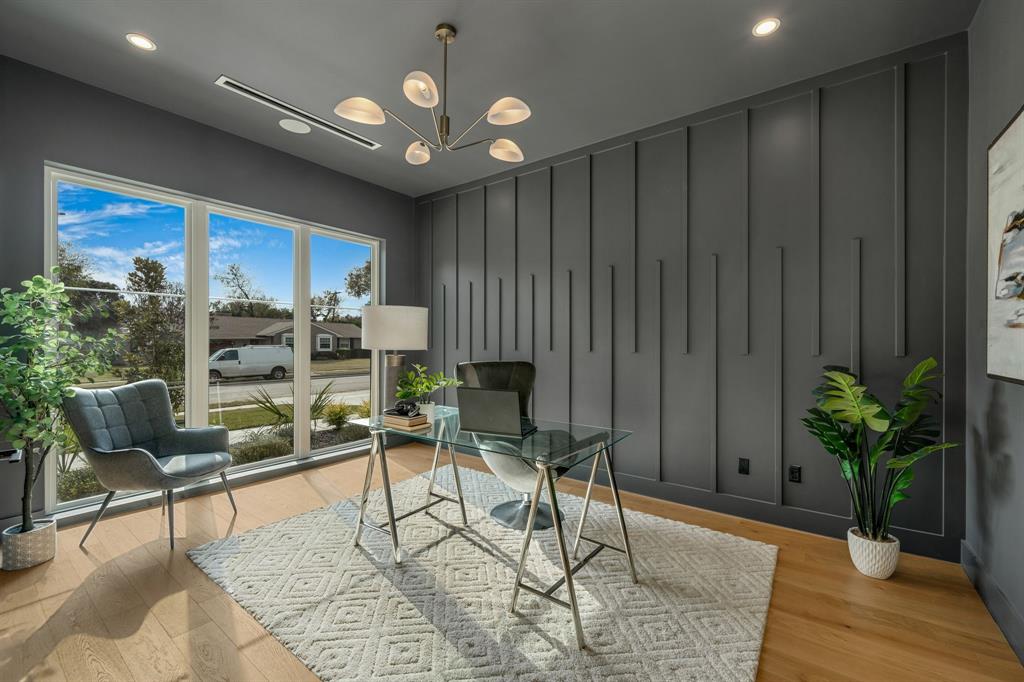 3627 Merrell Road Dallas, TX 75229 - Photo 6 of 39 a living room with furniture flowerpot and wooden floor