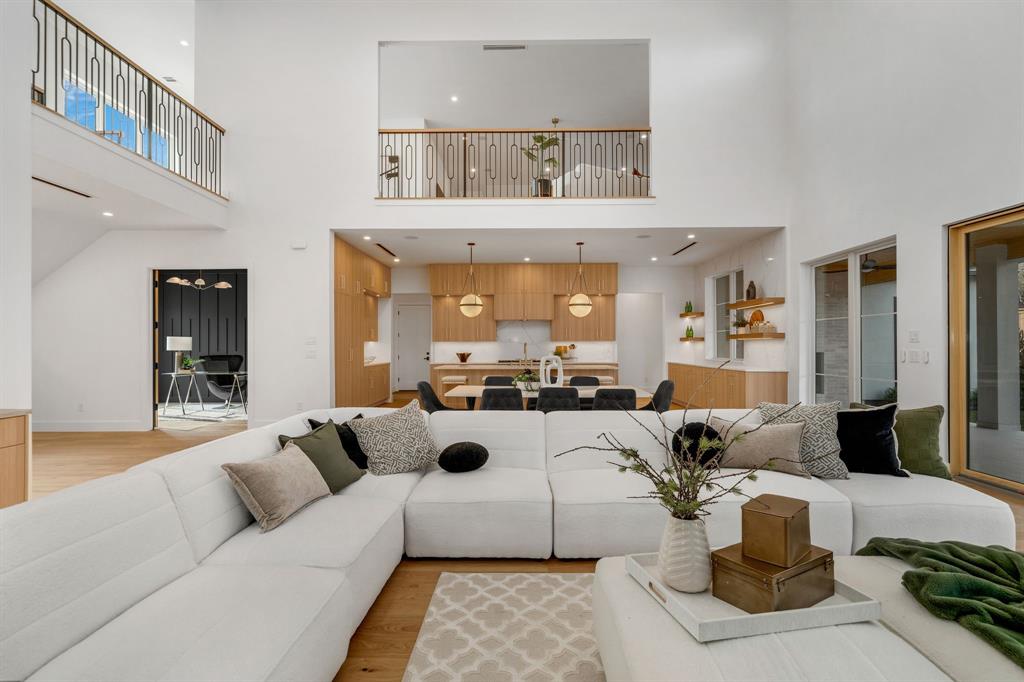 3627 Merrell Road Dallas, TX 75229 - Photo 9 of 39 a living room with furniture and a table