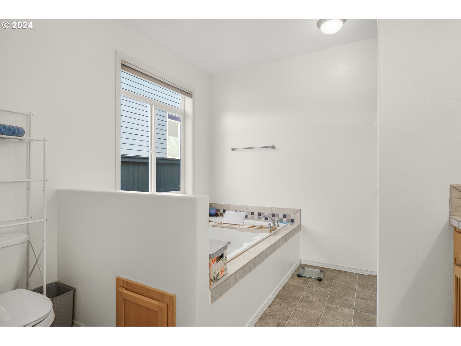 1514 West E Place La Center, WA 98629 - Photo 11 of 26 a view of furniture and window