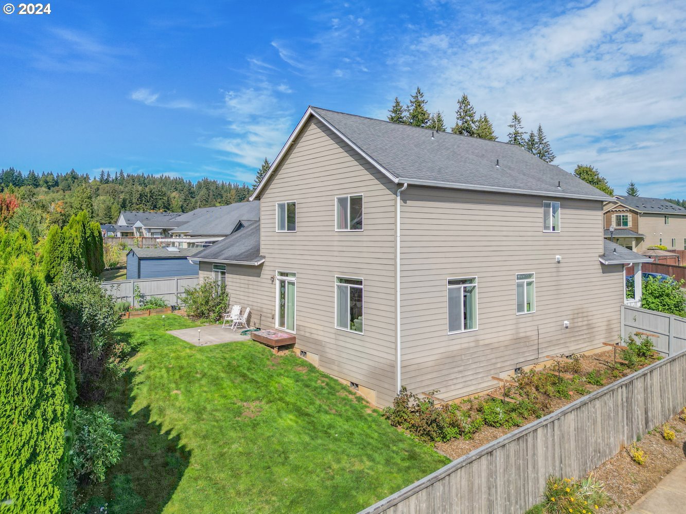 1514 West E Place La Center, WA 98629 - Photo 21 of 26 a view of a house with a yard