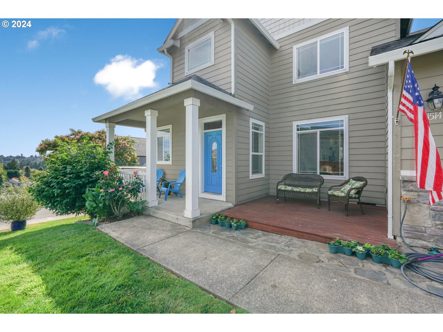 1514 West E Place La Center, WA 98629 - Photo 22 of 26 a view of a house with backyard and porch