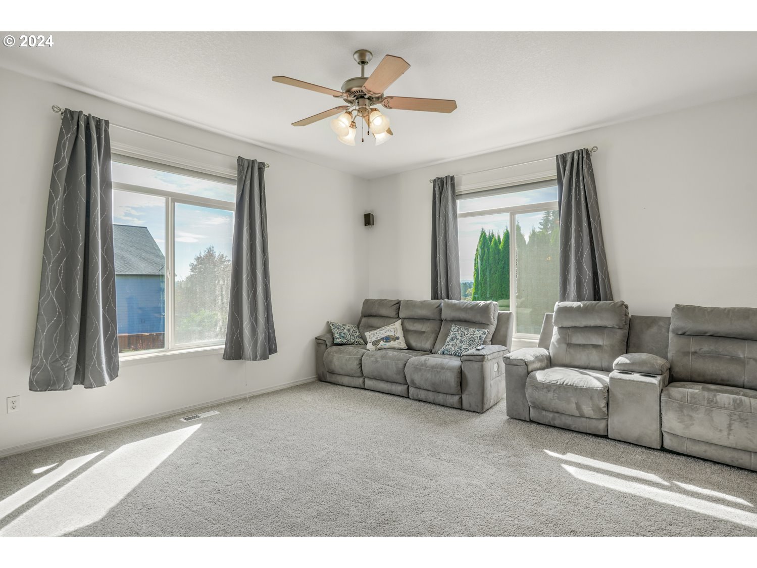 1514 West E Place La Center, WA 98629 - Photo 3 of 26 a living room with furniture and a large window