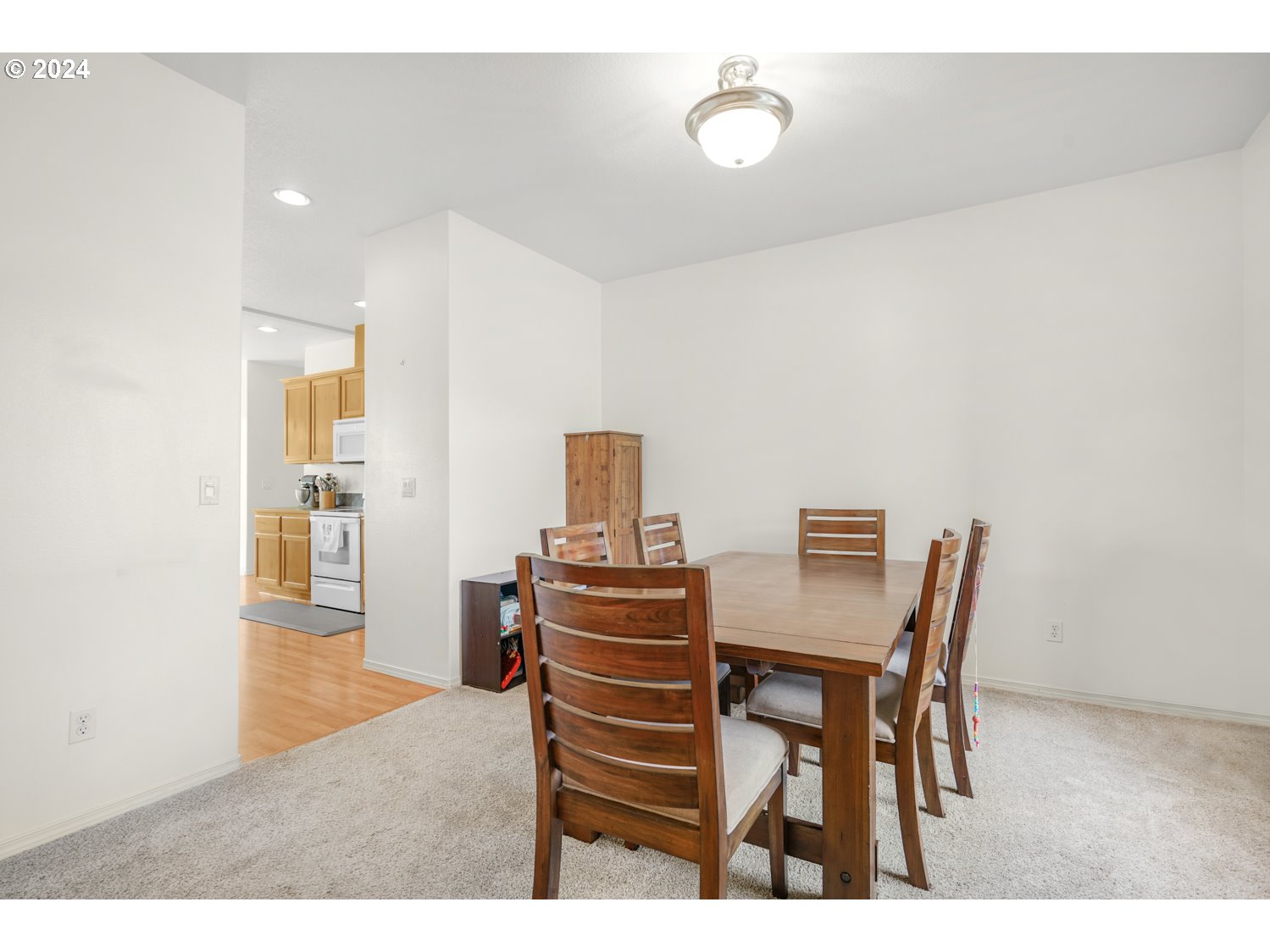 1514 West E Place La Center, WA 98629 - Photo 8 of 26 a view of a dining room with furniture